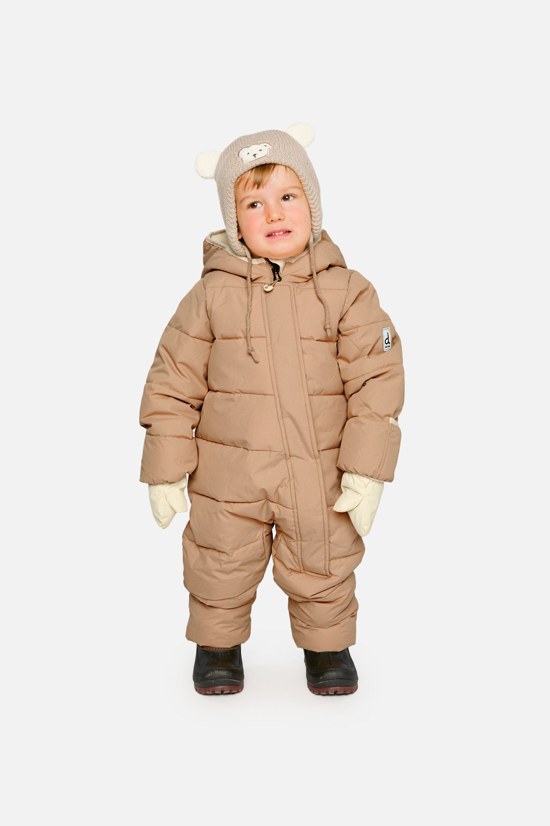 Baby wearing Deux par Deux Beige Baby Cloud snowsuit with fleece-lined hood