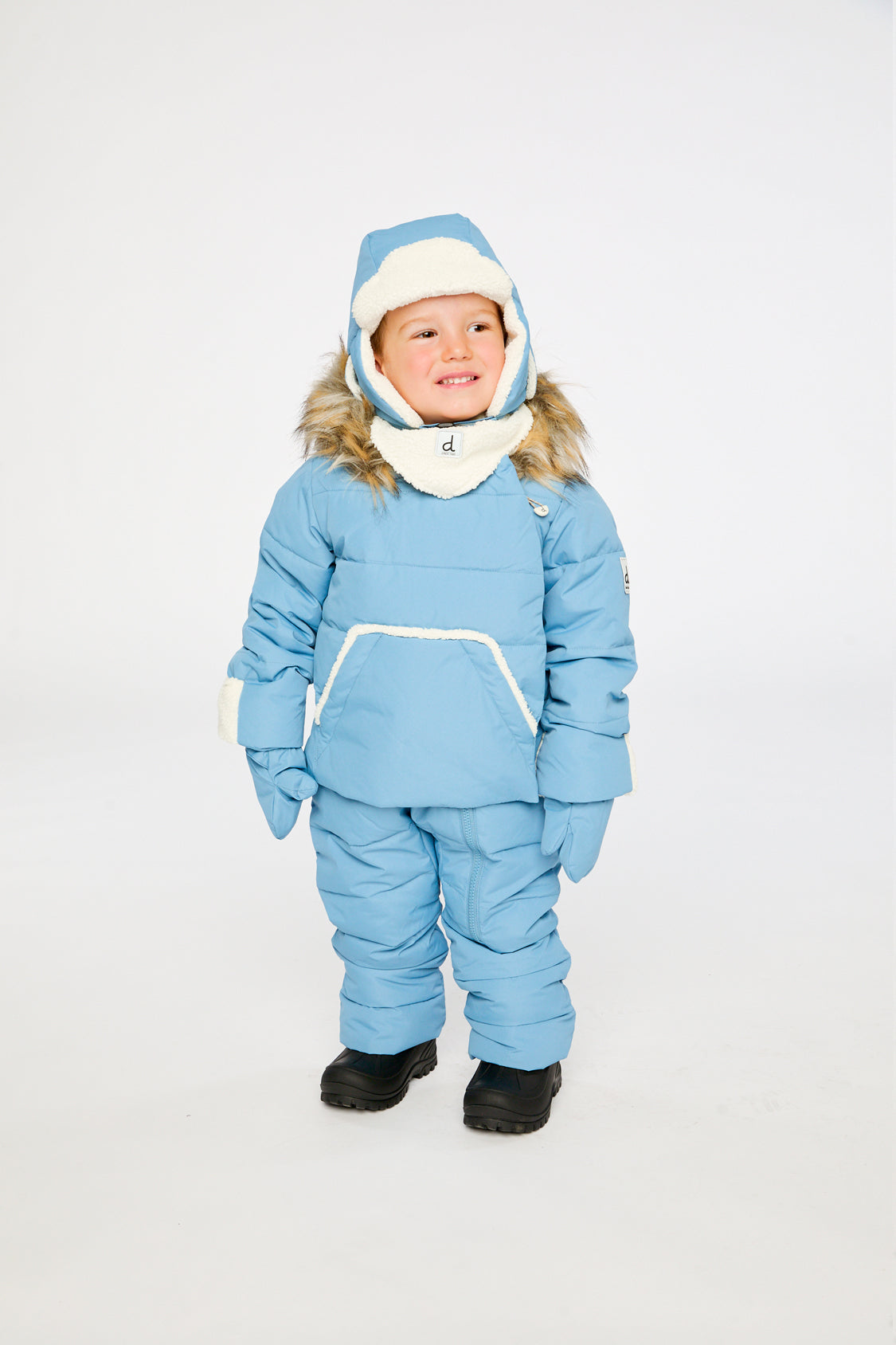 Baby boy wearing Deux par Deux Blue Grey SNUG one-piece winter snowsuit