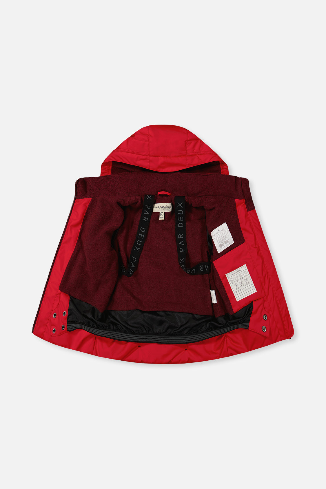 Boys red winter jacket interior with snow skirt and backpack straps