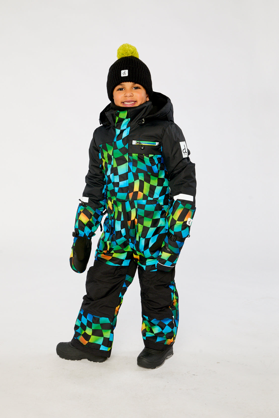 Deux par Deux kids PLAY one-piece snowsuit in Blue Checkered Print shown from an alternate modeled winter angle