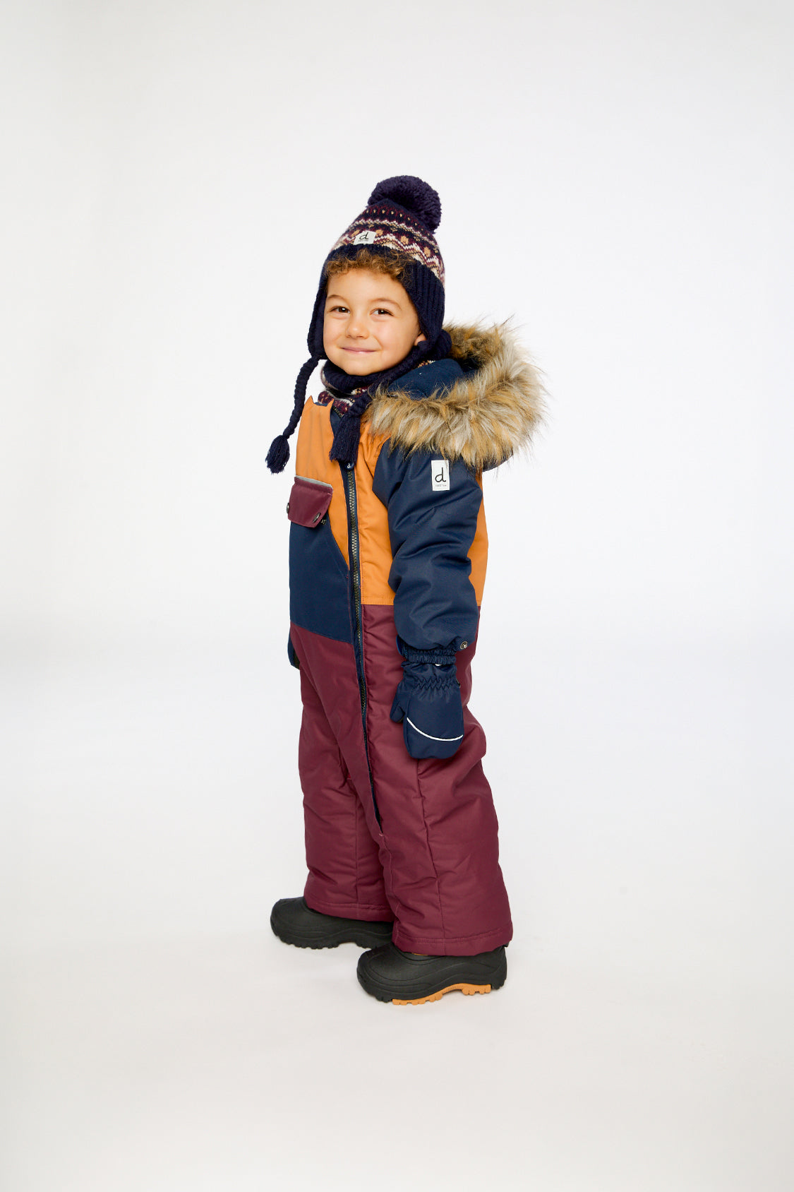 Deux par Deux baby car-seat one-piece snowsuit in Burgundy shown from an alternate modeled winter angle