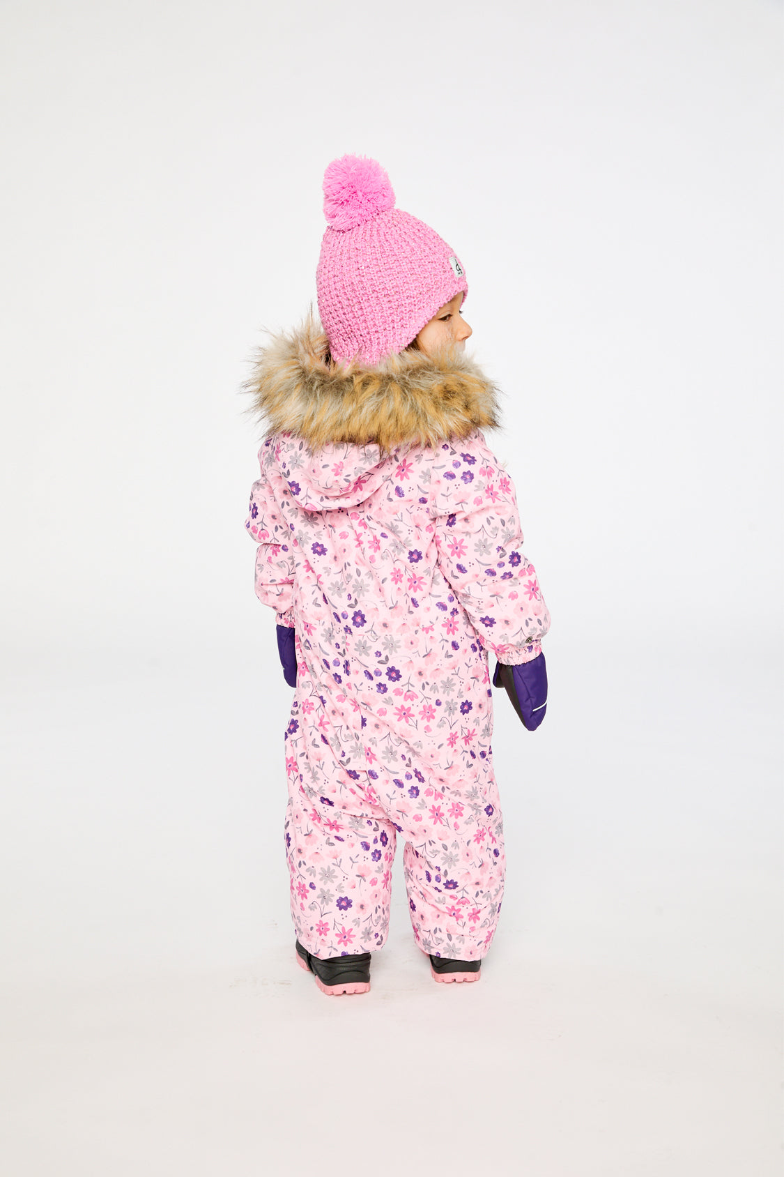 Baby pink mini flower snowsuit adapted for car seats shown in an alternate winter lookbook view