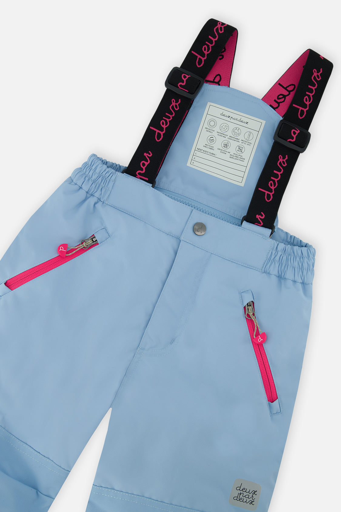 Deux par Deux girls PLAY snowsuit, mint green and light blue – close-up of the suspenders and zippered pant pockets