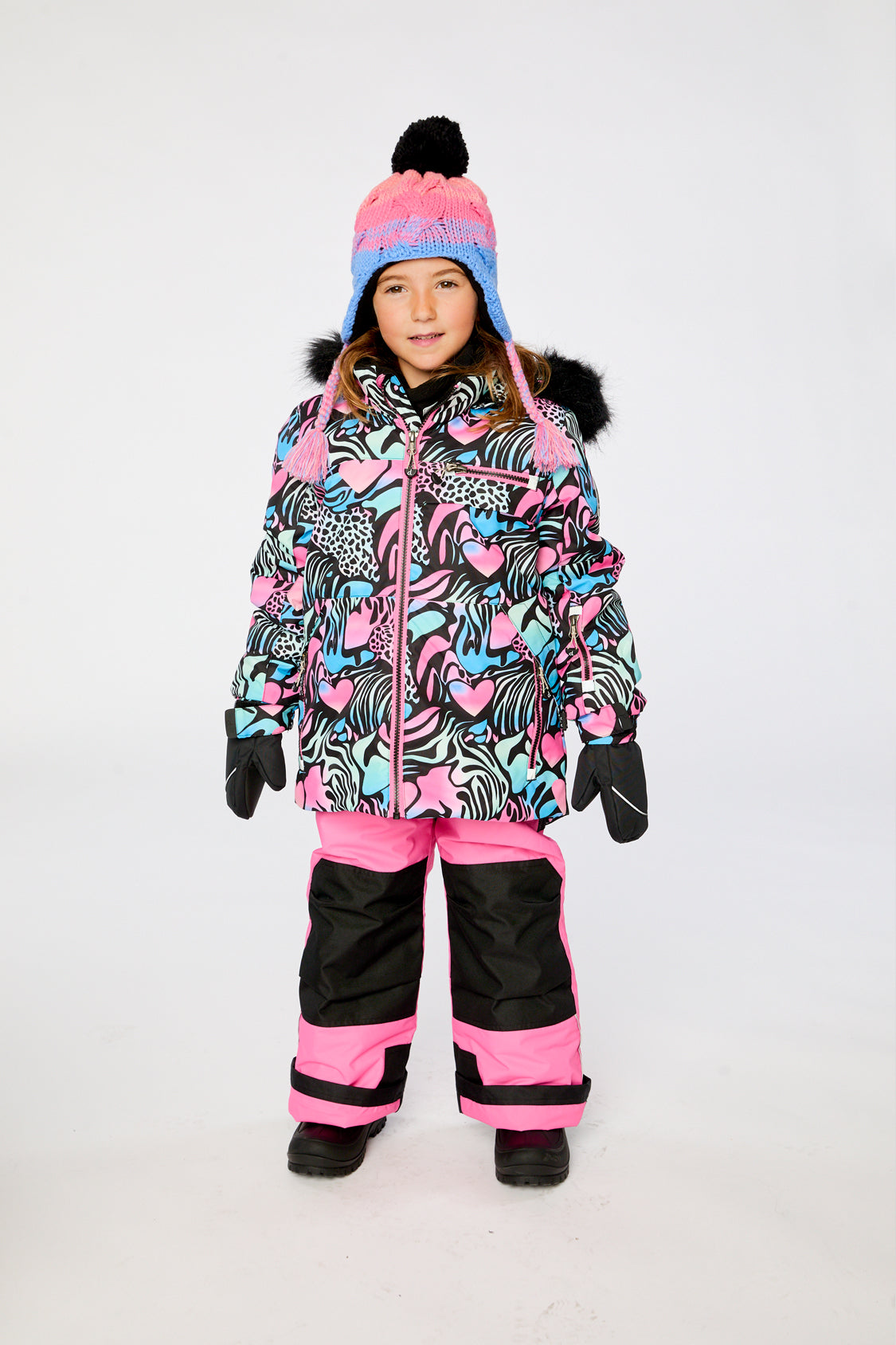 Girls black zebra print snowsuit with pink snow pants front view