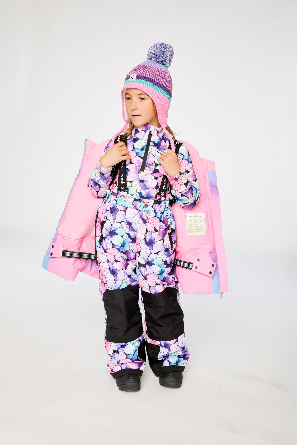 Child wearing the Deux par Deux pink-to-blue gradient PLAY two-piece snowsuit, lookbook photo 3
