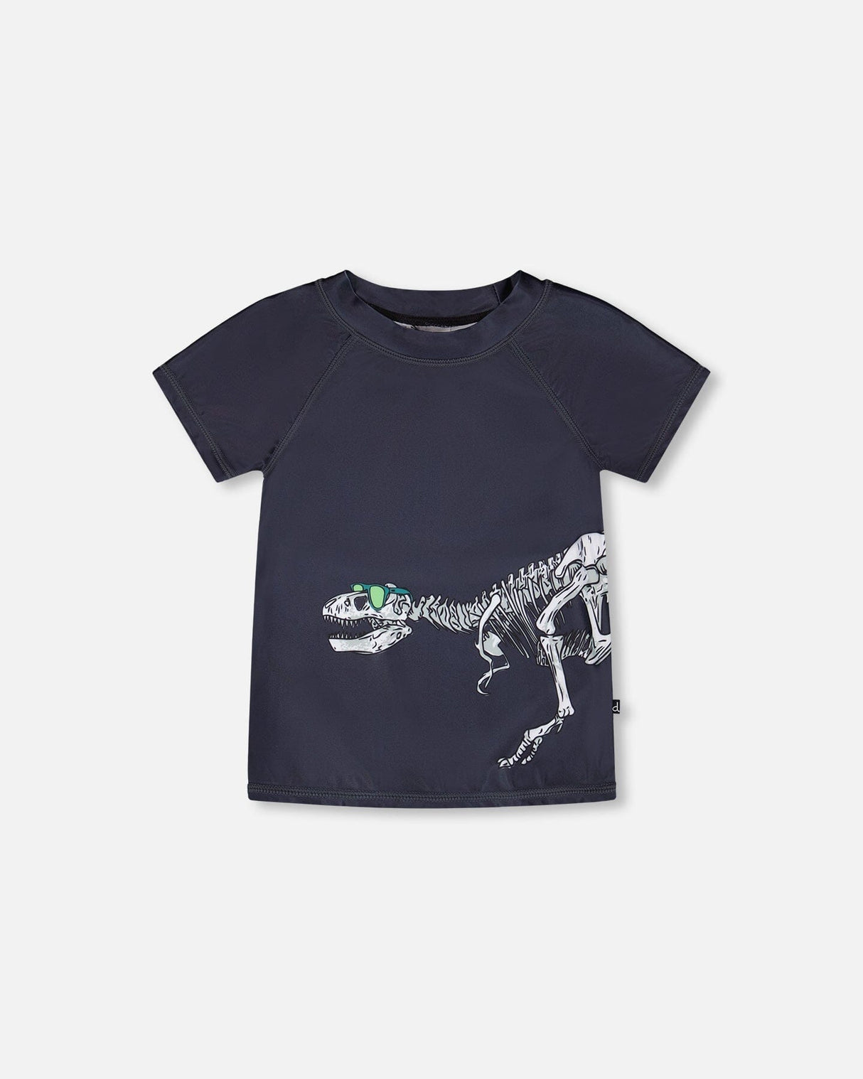 Front flat lay of Deux par Deux boy short sleeve kids rashguard in black with dinosaur skeleton print