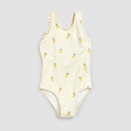 Front flat lay of Petit Lem birch one-piece swimsuit with yellow pineapple print and ruffled straps