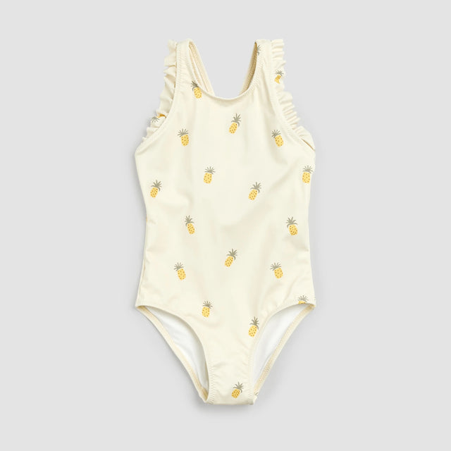 Front flat lay of Petit Lem birch one-piece swimsuit with yellow pineapple print and ruffled straps