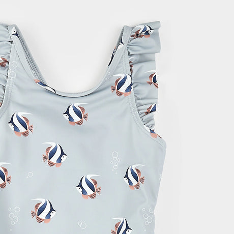 Close-up of tropical fish print and frilly straps on blue mist Petit Lem baby girl swimsuit
