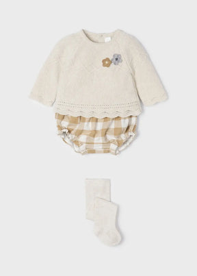 Front view of cream floral sweater checked bloomers and tights set