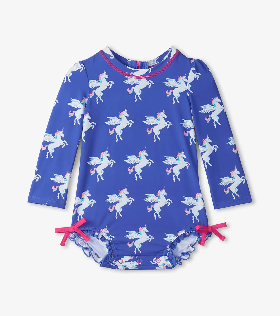 Front flat lay of Hatley baby girls blue long-sleeve rashguard swimsuit with white unicorn print and pink bows