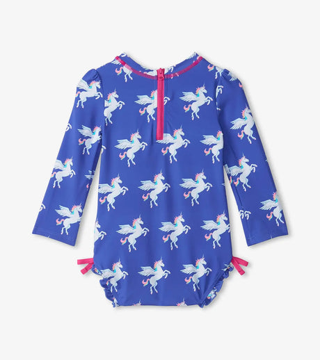 Back view of baby girls blue unicorn rashguard swimsuit with zipper closure and pink trim
