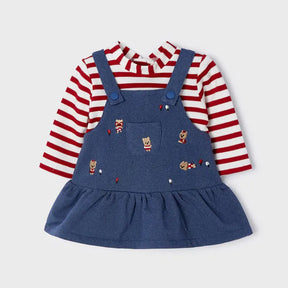 Front view of Mayoral baby outfit with striped bodysuit and navy teddy-motif jumper skirt