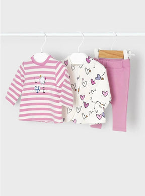 Flat lay of baby girls pink striped top printed jacket and legging set