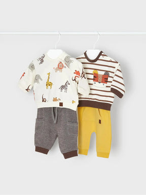 Flat lay of two baby boys animal-print tops with grey and yellow pants