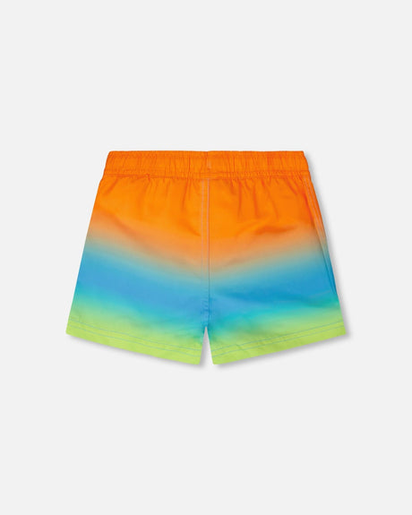 Back view of orange blue green gradient boardshorts for baby and boy