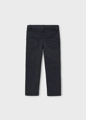 Back view of boys navy pants with patch pockets