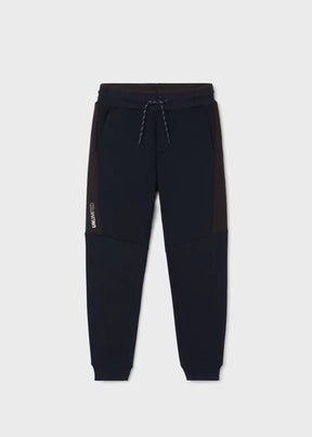 Front view of navy Mayoral boys track pants with dark contrast knee panels