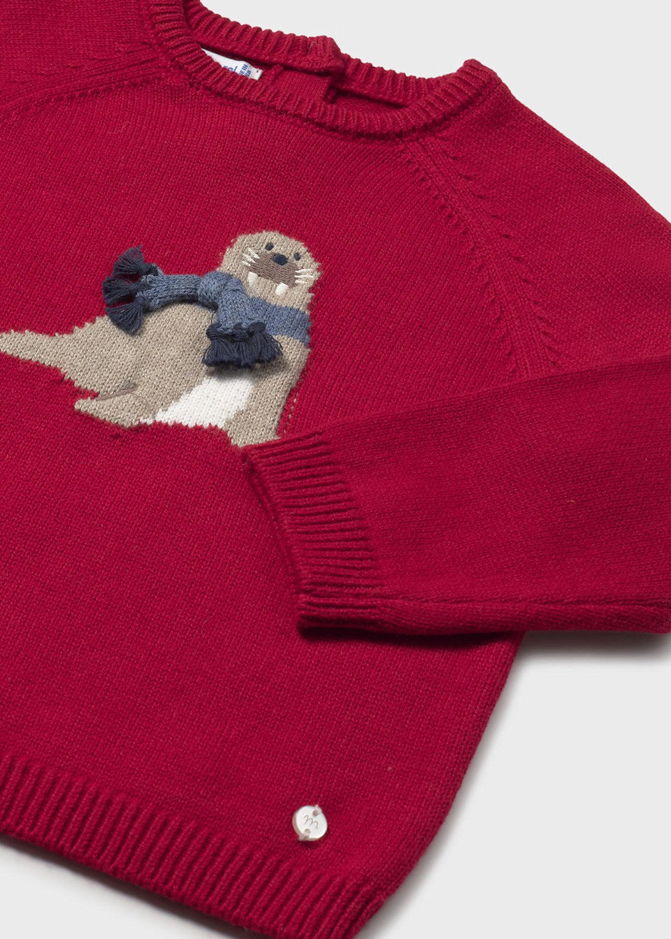 Close-up of embroidered animal intarsia design