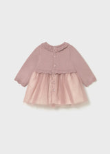 Flat lay back view showing button fastening