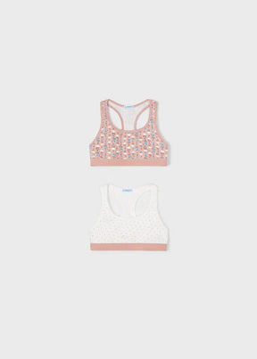 Front view of blush character print and ivory dotted girls training bras