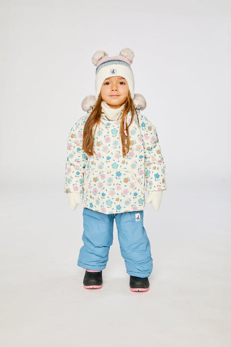 Baby wearing the Deux par Deux baby two-piece snowsuit in White with Floral Print in a winter lookbook view