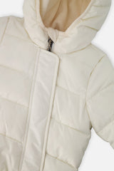 Close-up of the off-white quilting, front zipper and fleece-lined hood
