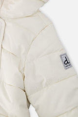 Close-up of the off-white quilted sleeve with Deux par Deux logo patch