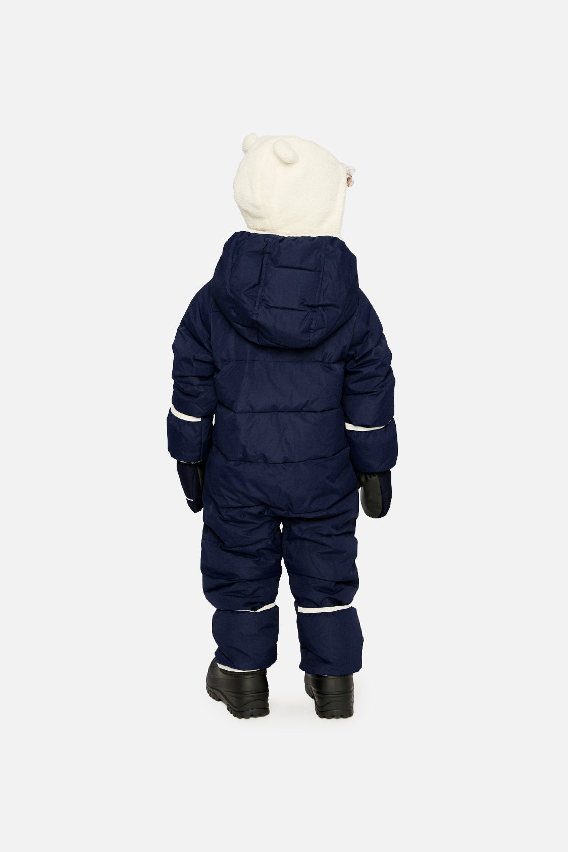 Baby boy in Dark Blue Deux par Deux Baby Cloud snowsuit with fold-over cuffs and ankles