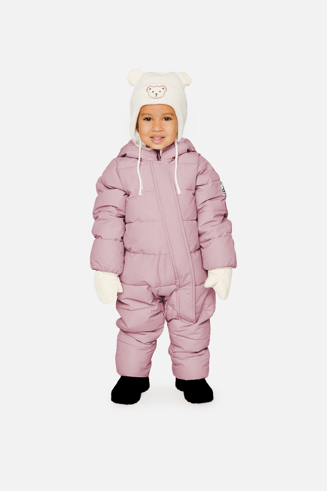 Baby girl wearing Deux par Deux Lavender Baby Cloud snowsuit with fleece-lined hood