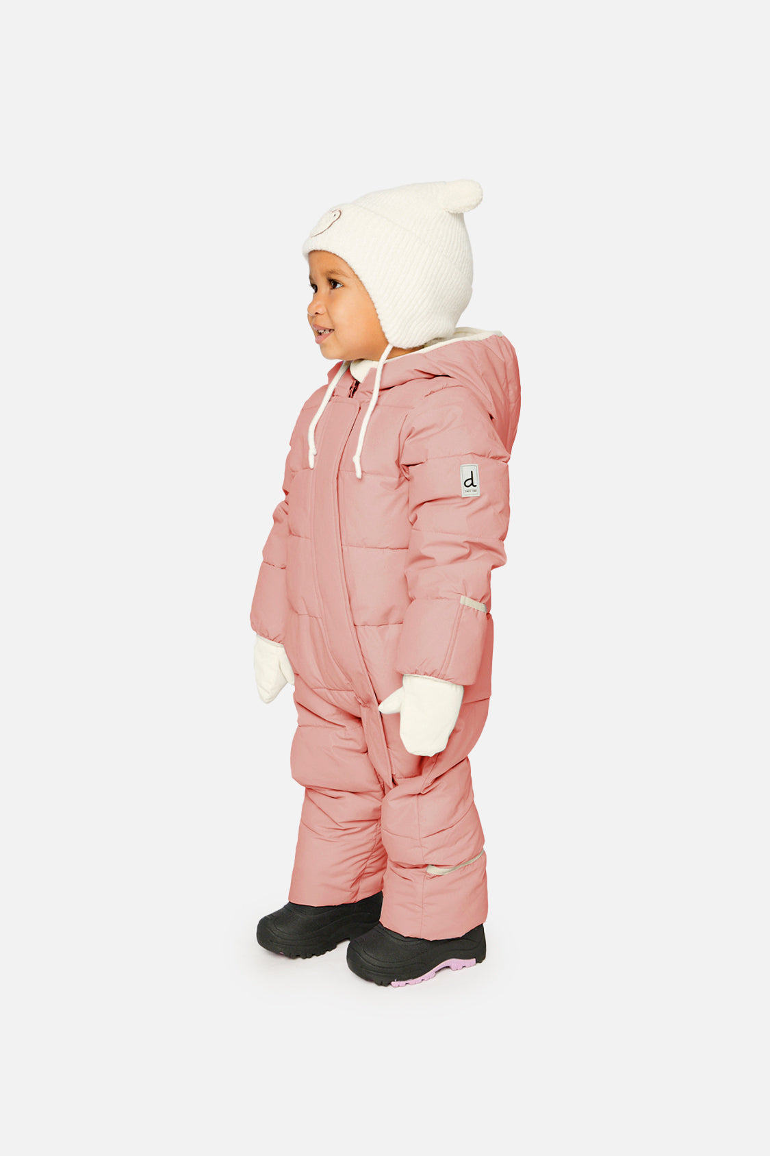 Baby girl wearing Deux par Deux Pale Dusty Pink Baby Cloud snowsuit with fleece-lined hood