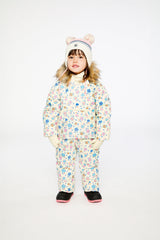 Baby girl wearing Deux par Deux white floral Baby Snug snowsuit with faux fur hood