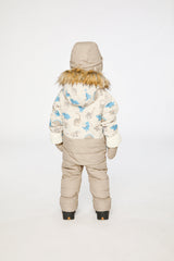 Baby boy in Deux par Deux Blue Dinosaur snowsuit with fold-over sherpa cuffs and ankles