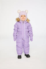 Baby wearing the Deux par Deux Baby Original puffy one-piece snowsuit in Violet in a winter lookbook view
