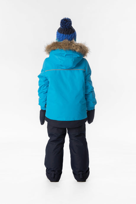 Boy in the bright blue and navy Deux par Deux DISCOVER snowsuit, back view