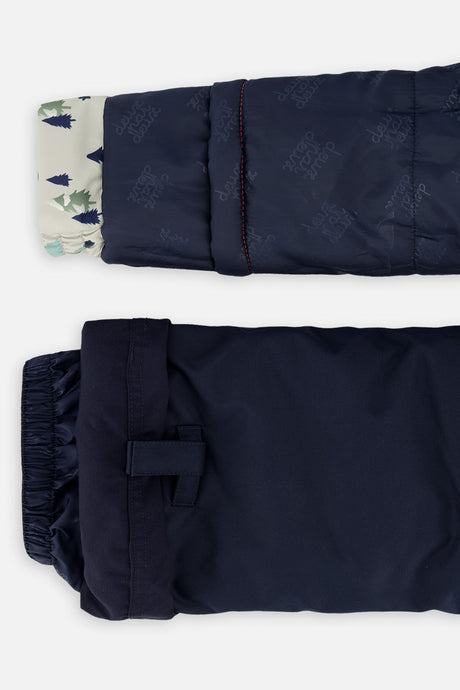 Deux par Deux boys DISCOVER snowsuit, grey dinosaur print – sleeve and pant hem extensions for growing room