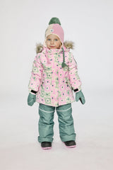 Girl wearing Deux par Deux white and retro pink DISCOVER winter snowsuit