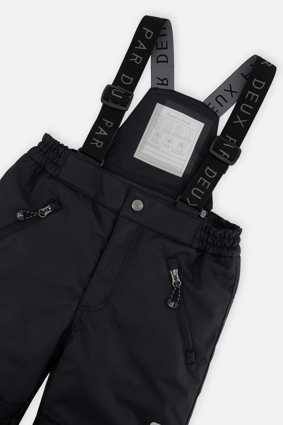 Deux par Deux boys PLAY snowsuit, red and black – close-up of the suspenders and zippered pant pockets