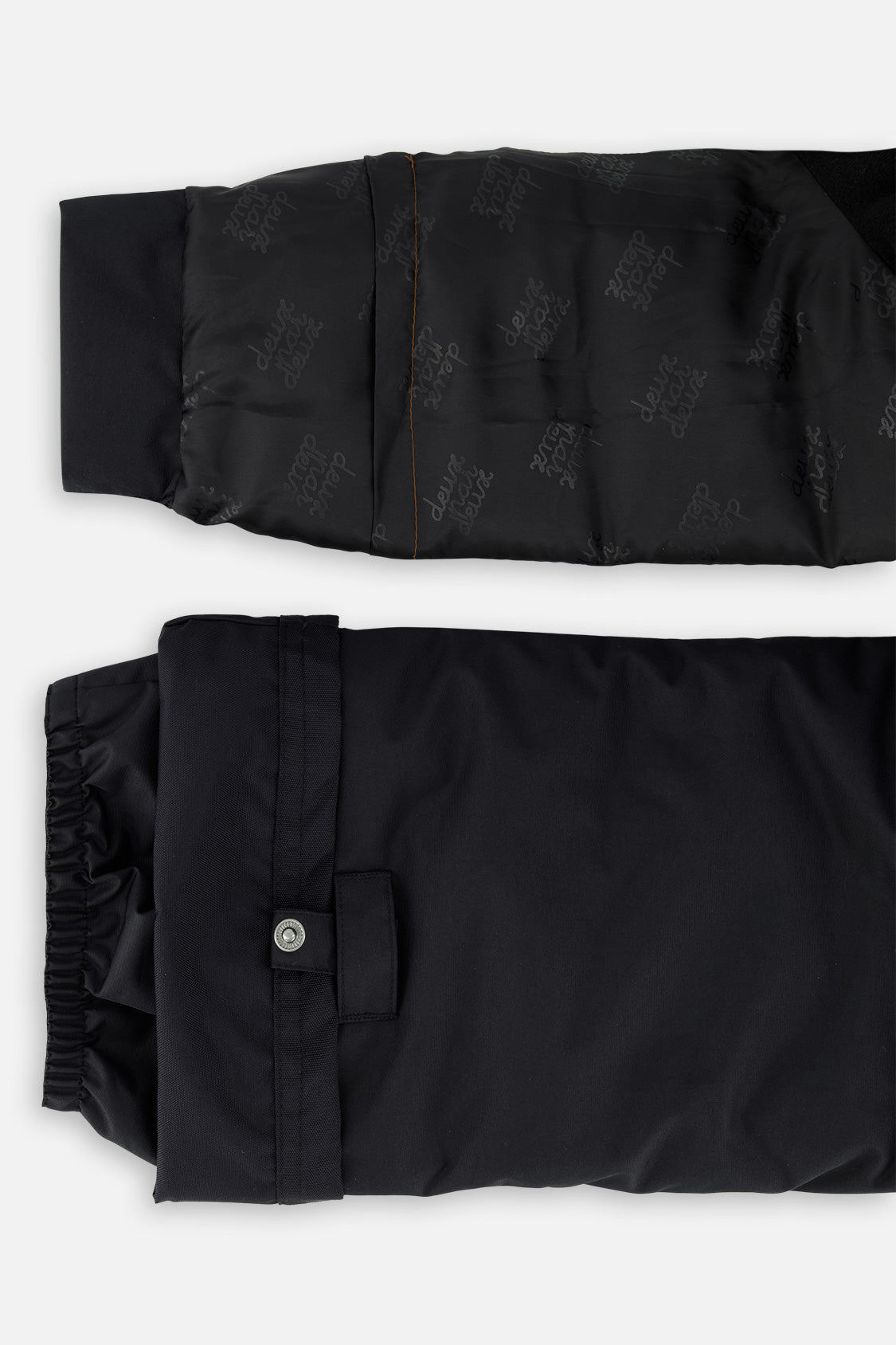 Deux par Deux boys PLAY snowsuit, all-black – sleeve and pant hem extensions for growing room