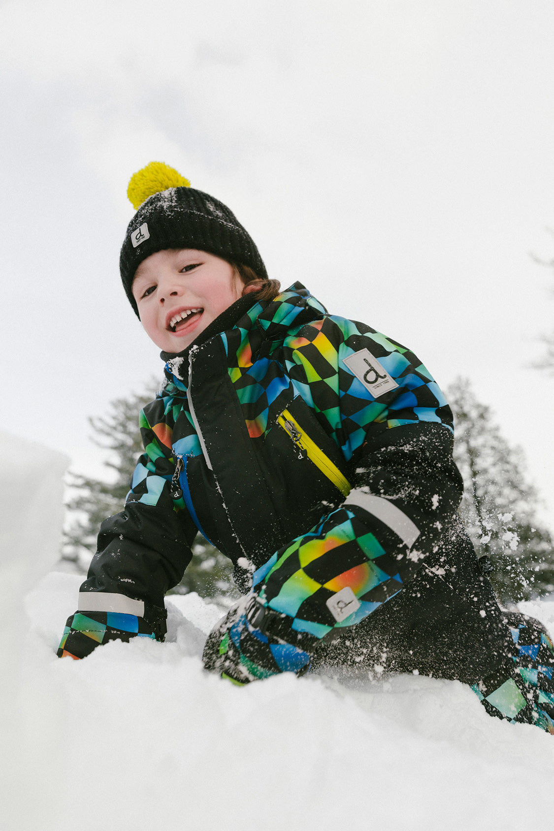Boys 10K waterproof checkerboard snowsuit during active snow play