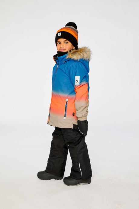 Deux par Deux PLAY two-piece snowsuit in Blue and Orange Gradient shown from an alternate modeled winter angle