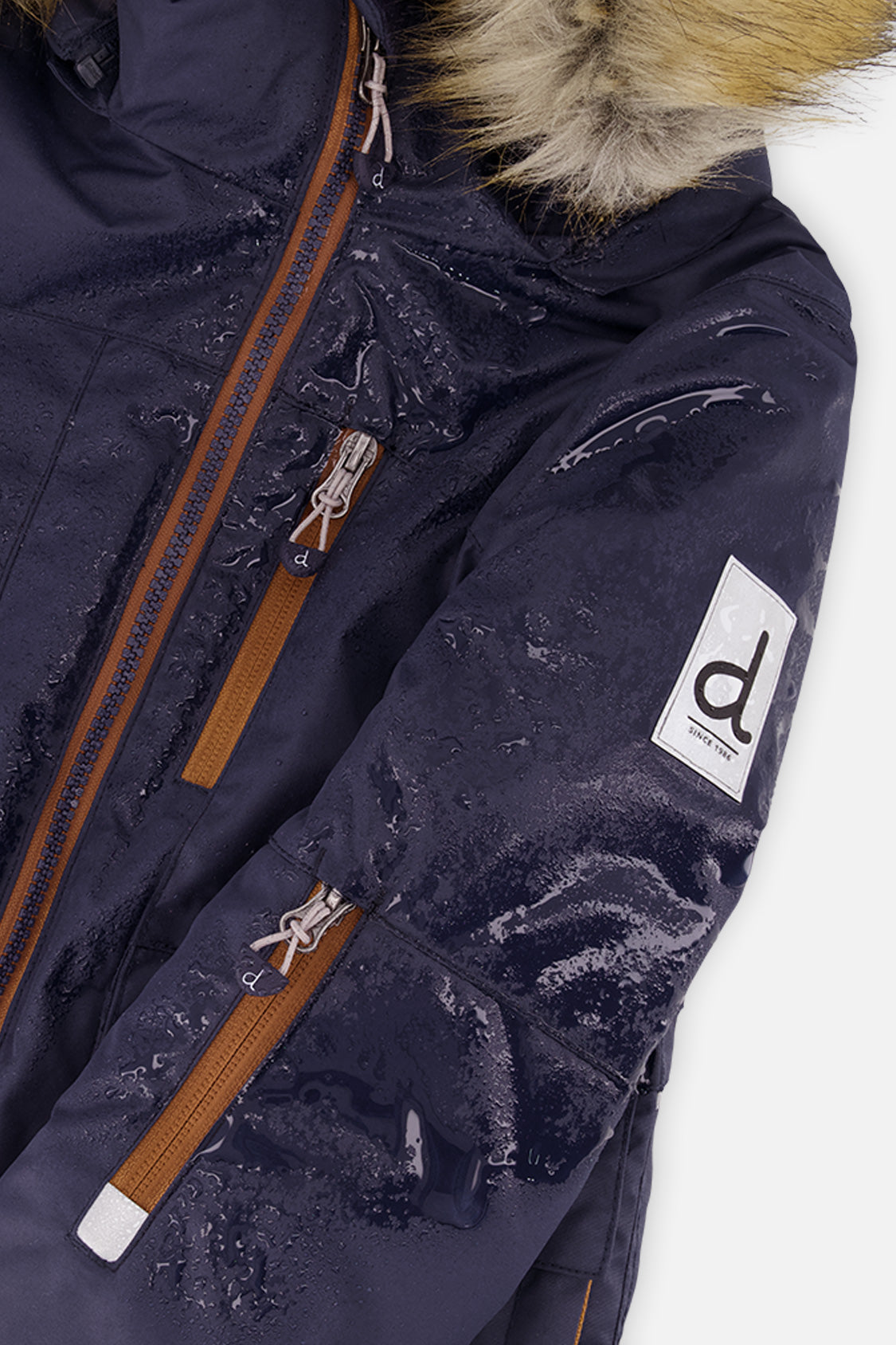 Deux par Deux boys' PLAY snowsuit with navy blue jacket and brown snow pants, additional studio angle