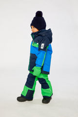Deux par Deux PLAY two-piece snowsuit in Royal Blue and Green Colorblock shown from an alternate modeled winter angle