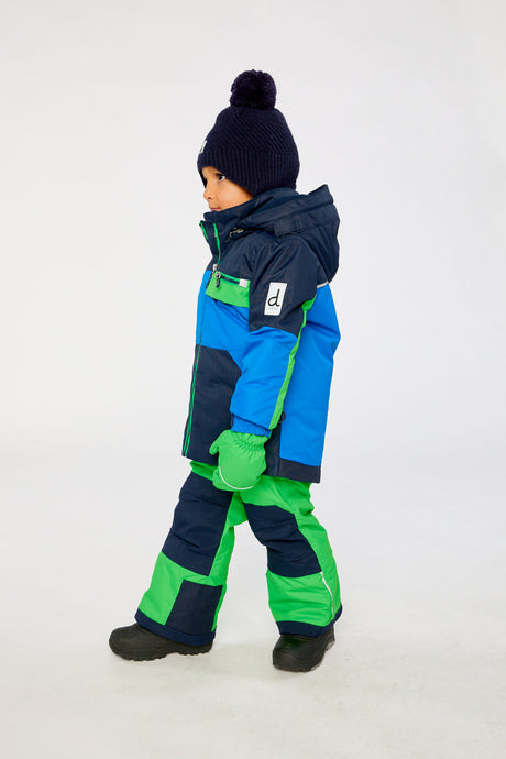 Deux par Deux PLAY two-piece snowsuit in Royal Blue and Green Colorblock shown from an alternate modeled winter angle