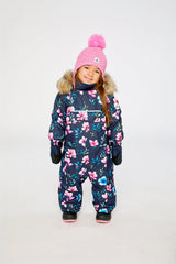 Baby wearing the Deux par Deux baby car-seat one-piece snowsuit in Blue Floral Print in a winter lookbook view