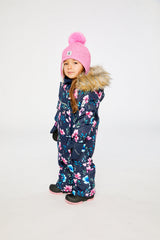 Deux par Deux baby car-seat one-piece snowsuit in Blue Floral Print shown from an alternate modeled winter angle