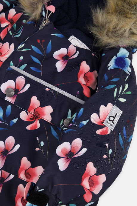 Close-up of the navy blue floral print fabric with front zipper and Deux par Deux logo