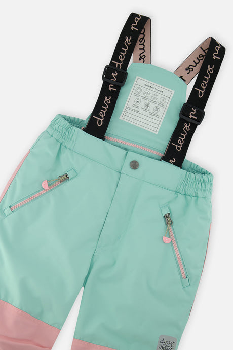 Deux par Deux girls PLAY snowsuit, multicolor line print – close-up of the suspenders and zippered pant pockets