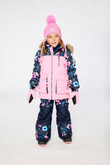 Girl wearing Deux par Deux pink PLAY snowsuit with floral jacket panels and snow pants