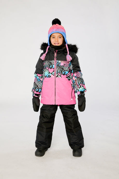 Girl wearing Deux par Deux black zebra PLAY snowsuit with pink colorblock jacket